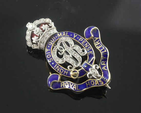 A George V gold, diamond and enamel set Royal Artillery sweethearts brooch, 33mm.